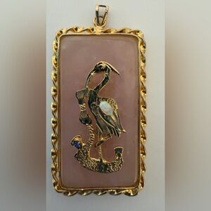 Elegant Gold tone Heron Pendant on Pink stone